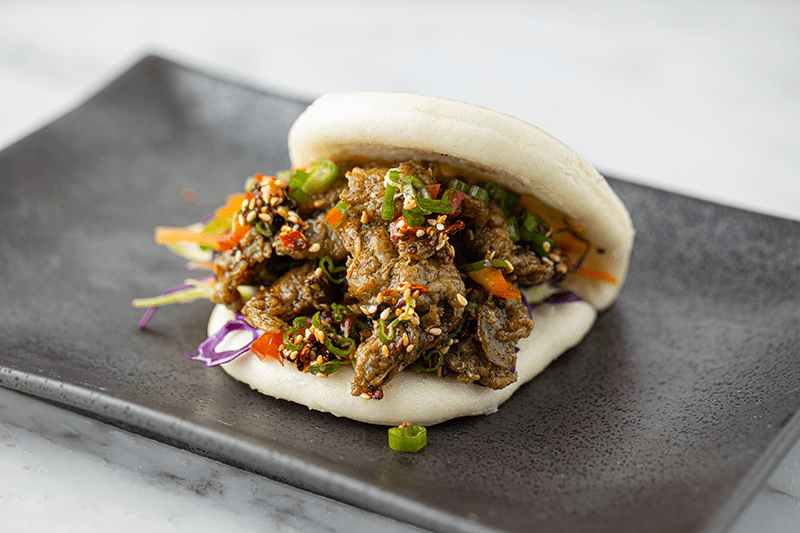 Steamed bao buns with spicy cauliflower