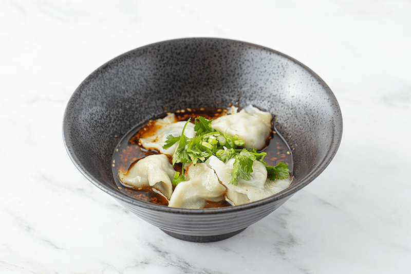 Chive Dumplings in spicy sauce